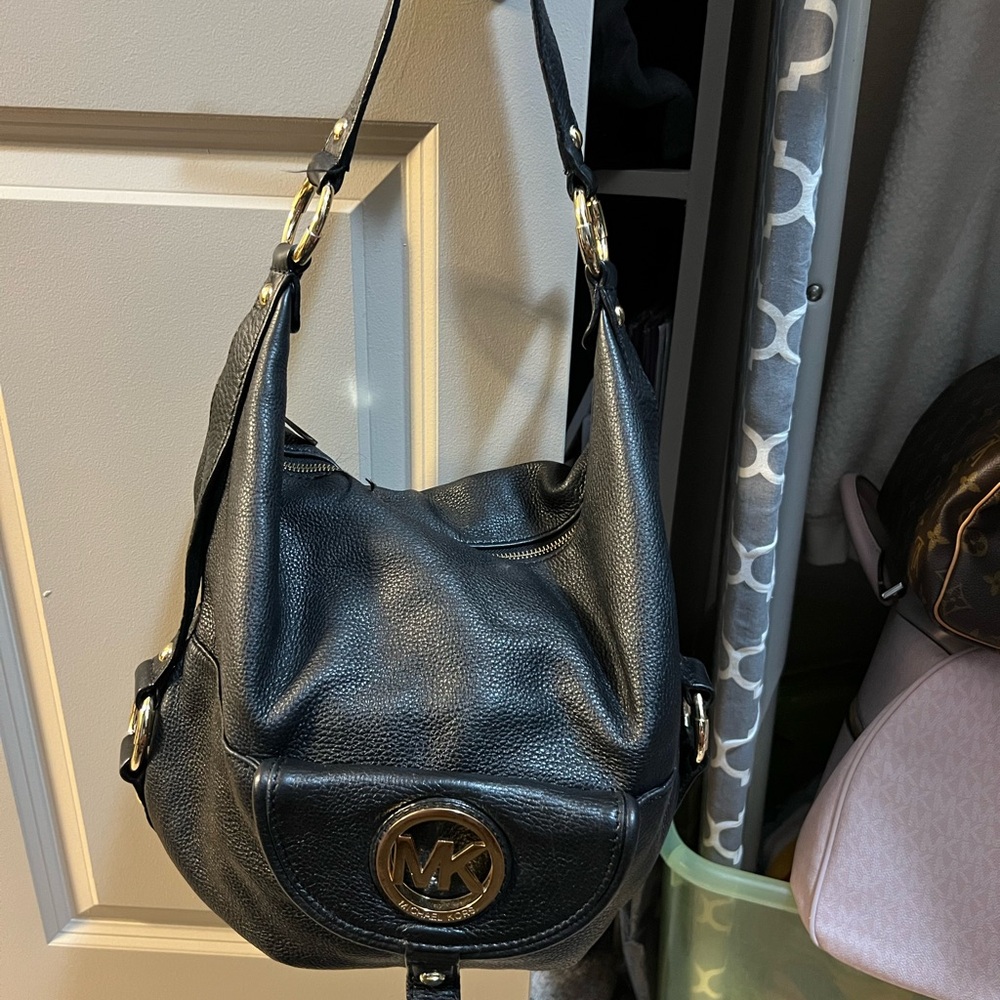 Michael Kors Black Hobo Bag with Gold Accents